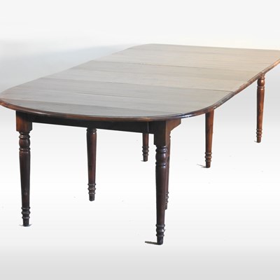 Lot 318 - A fruitwood extending dining table, with six...