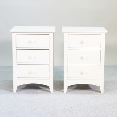 Lot 176 - A pair of Julian Bowen cream painted bedside...
