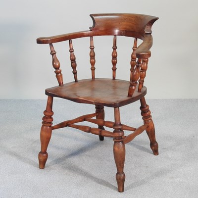 Lot 324 - An early 20th century elm seated smoker's bow...