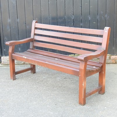Lot 272 - A slatted wooden garden bench
