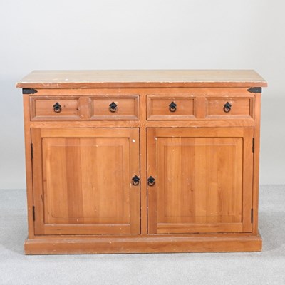 Lot 470 - A Mexican pine sideboard, on a plinth base