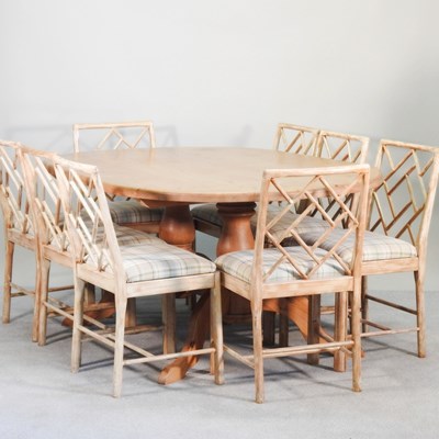 Lot 512 - A modern dining twin pedestal pine dining...
