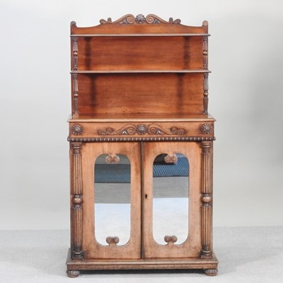 Lot 211 - A late Regency carved mahogany chiffonier, of...