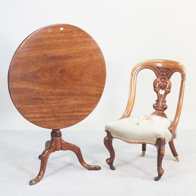 Lot 231 - A 19th century mahogany tripod table, with a...