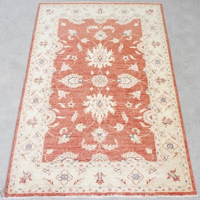 Lot 239 - A modern Kashan rug, with scrolling foliate...