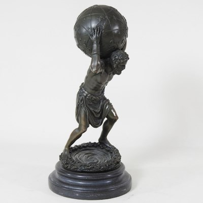 Lot 121 - A bronze statue of Atlas, modern, on a...