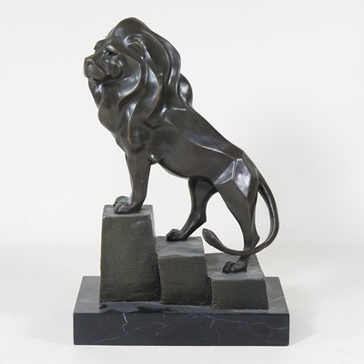Lot 190 - A modern Art Deco bronze statue of a lion, on...