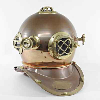 Lot 419 - A reproduction vintage copper diver's helmet,...