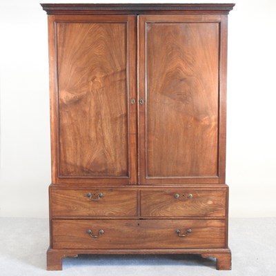 Lot 497 - A George III mahogany dwarf linen press, on...