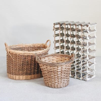 Lot 384 - A wine rack, together with two wicker log...