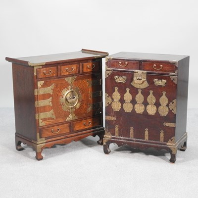 Lot 188 - A Chinese oak and brass mounted side cabinet,...
