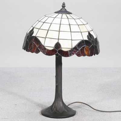 Lot 236 - A Tiffany style table lamp and shade