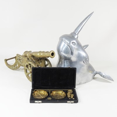 Lot 507 - A metal rhino head, together with a brass...