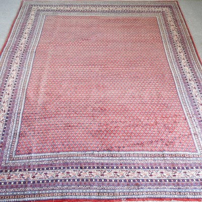 Lot 131 - A Persian arak carpet, with all over design on...