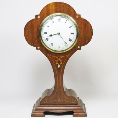 Lot 22 - An Edwardian balloon shaped mantel clock, with...