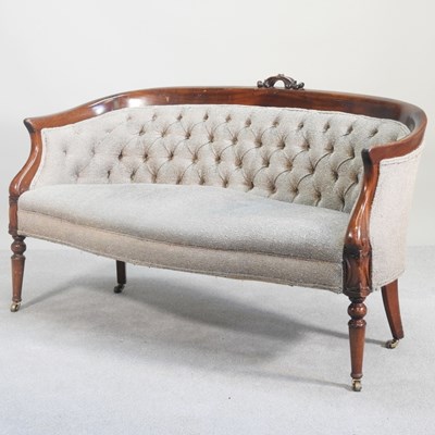 Lot 519 - A Victorian blue upholstered sofa, with a...