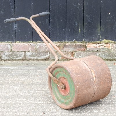 Lot 233 - A small iron garden roller