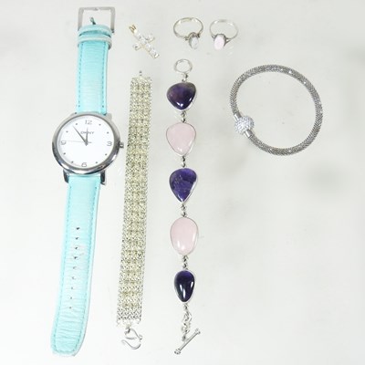 Lot 233 - A DKNY dress watch, together with two silver...