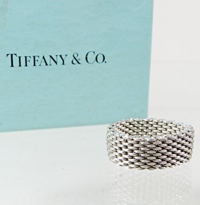 Lot 172 - A modern Tiffany & Co silver ring, of mesh...