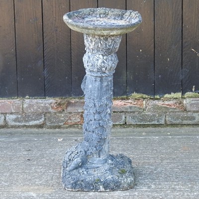 Lot 143 - A cast stone bird bath, 78cm high