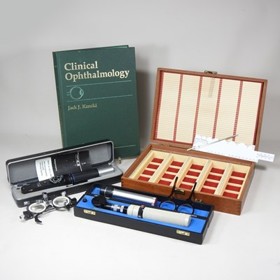Lot 499 - A collection of optician's equipment, some cased