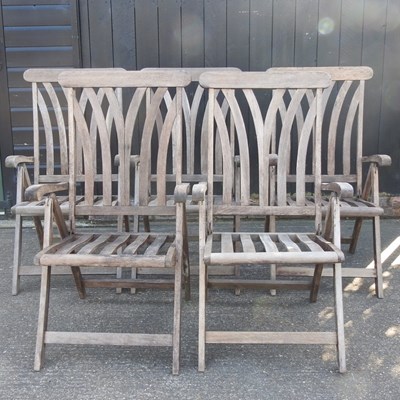 Lot 184 - A set of five teak folding garden armchairs (5)