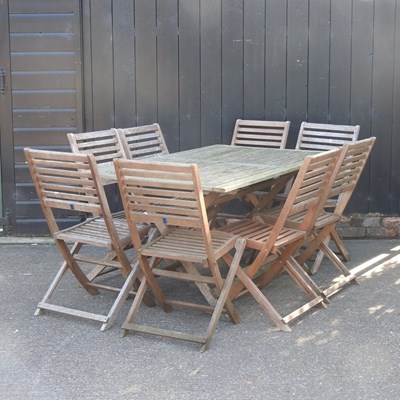 Lot 93 - A folding wooden garden table, together with a...