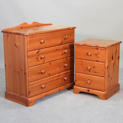 Lot 317 - A modern pine chest of drawers, together with...