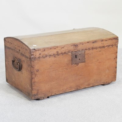 Lot 174 - A stripped pine dome top trunk, with a hinged lid