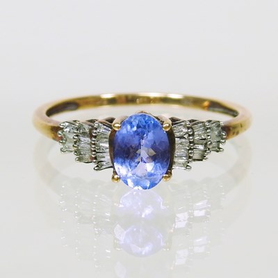Lot 204 - A 9 carat gold tanzanite dress ring, with...