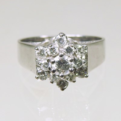 Lot 20 - An 18 carat white gold and diamond set cluster...