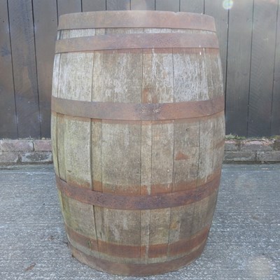 Lot 154 - A coopered wooden barrel, 90cm high
