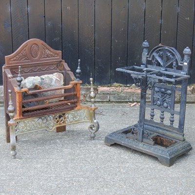 Lot 413 - An iron fire grate, 76cm high, together with a...