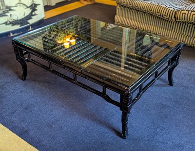 Lot 48 - A black painted faux bamboo coffee table,...