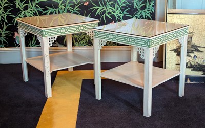 Lot 51 - A pair of cream and green painted chinoiserie...