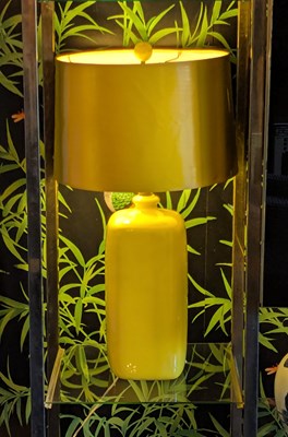 Lot 60 - A yellow glazed pottery table lamp, having a...