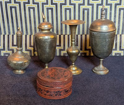 Lot 62 - A collection of four Indian etched brass...