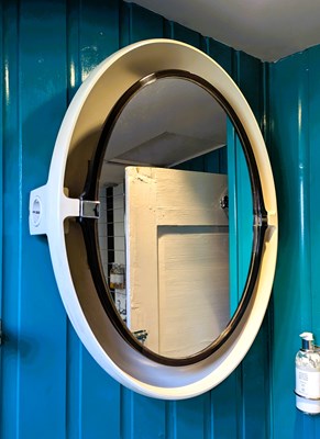 Lot 127 - A 1970s Allibert oval plastic backlight mirror,...