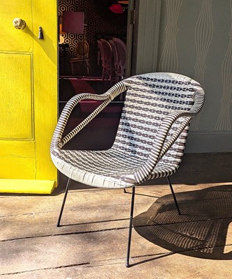 Lot 131 - A 1960s plastic weave armchair