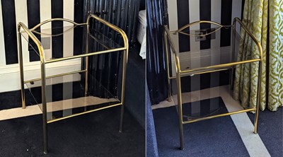 Lot 154 - A pair of 1980s brass and smoked glass bedside...