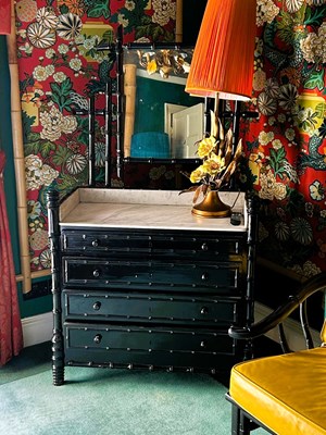 Lot 174 - A black painted faux bamboo marble top...