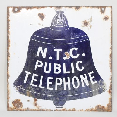 Lot 239 - An early 20th century enamel advertising sign...