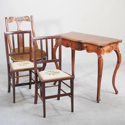 Lot 335 - A 19th century mahogany folding tea table, on...