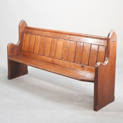 Lot 85 - A 19th century Gothic style stained pine pew,...