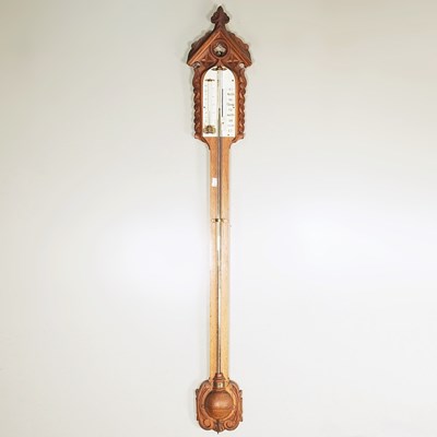 Lot 36 - A Victorian Gothic revival oak cased stick...