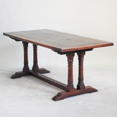 Lot 525 - A mid 20th century elm refectory dining table,...