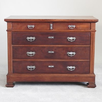 Lot 446 - A French teak chest of drawers, 20th century,...