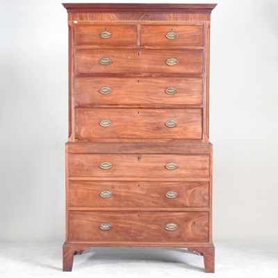 Lot 651 - A George III mahogany chest on chest, with...