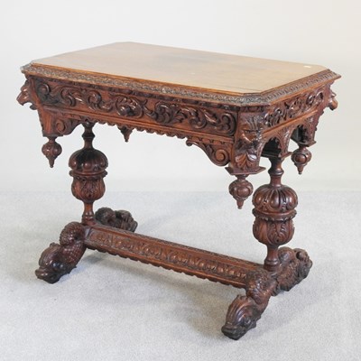 Lot 178 - A 19th century heavily carved oak centre table,...