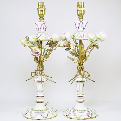 Lot 79 - A pair of Naples porcelain and gilt metal...